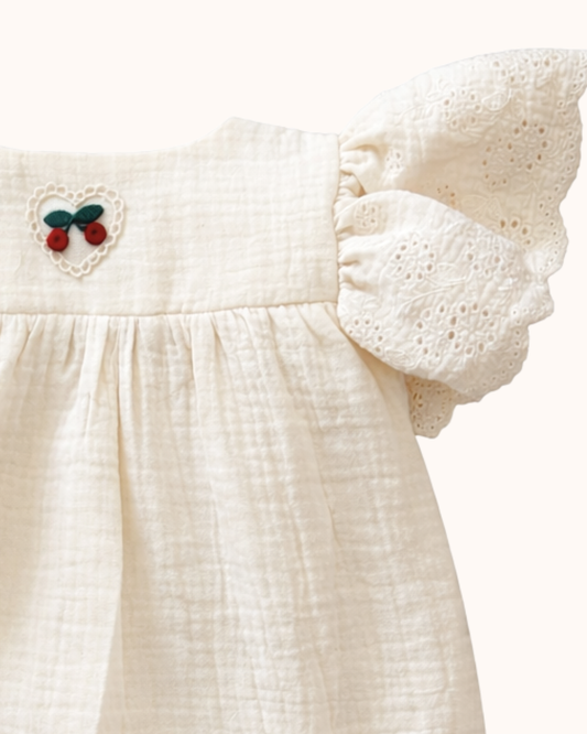 APRIL Rampers muślinowy z haftami