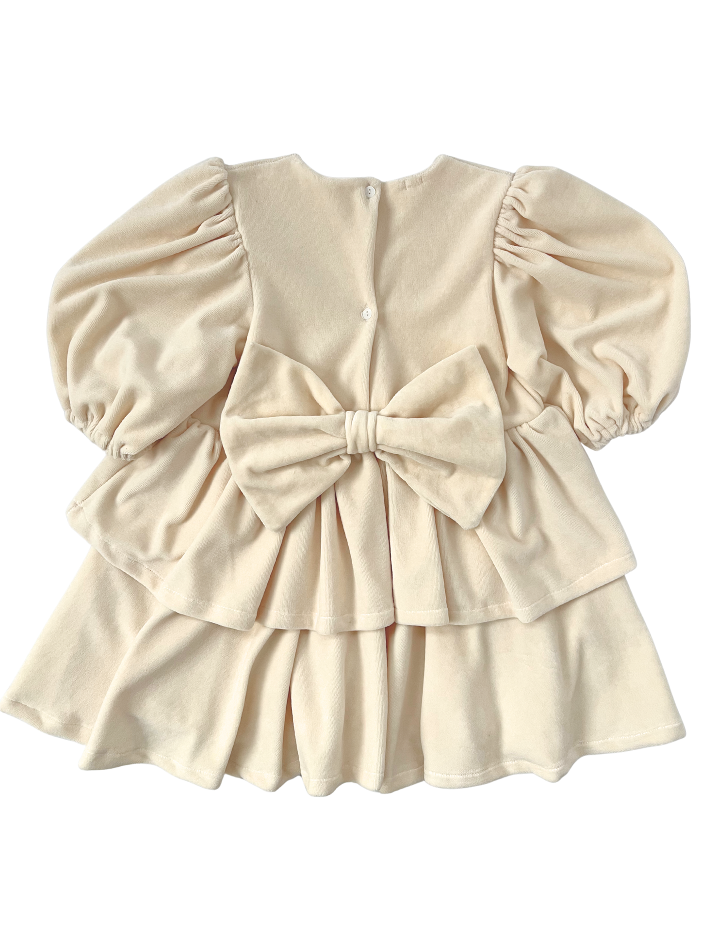 Welurowa sukienka z falbankami i kokardą- kremowa