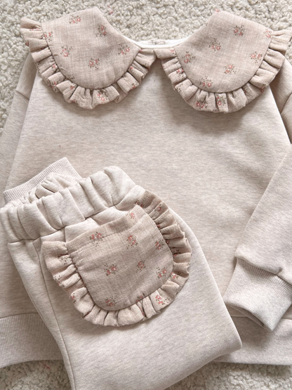 Dresowe spodnie z kontrastową kieszonką na pupie