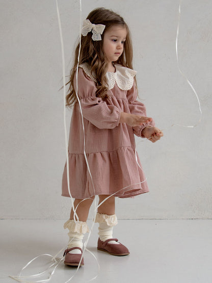 Muślinowa sukienka z rozkloszowanym dołem