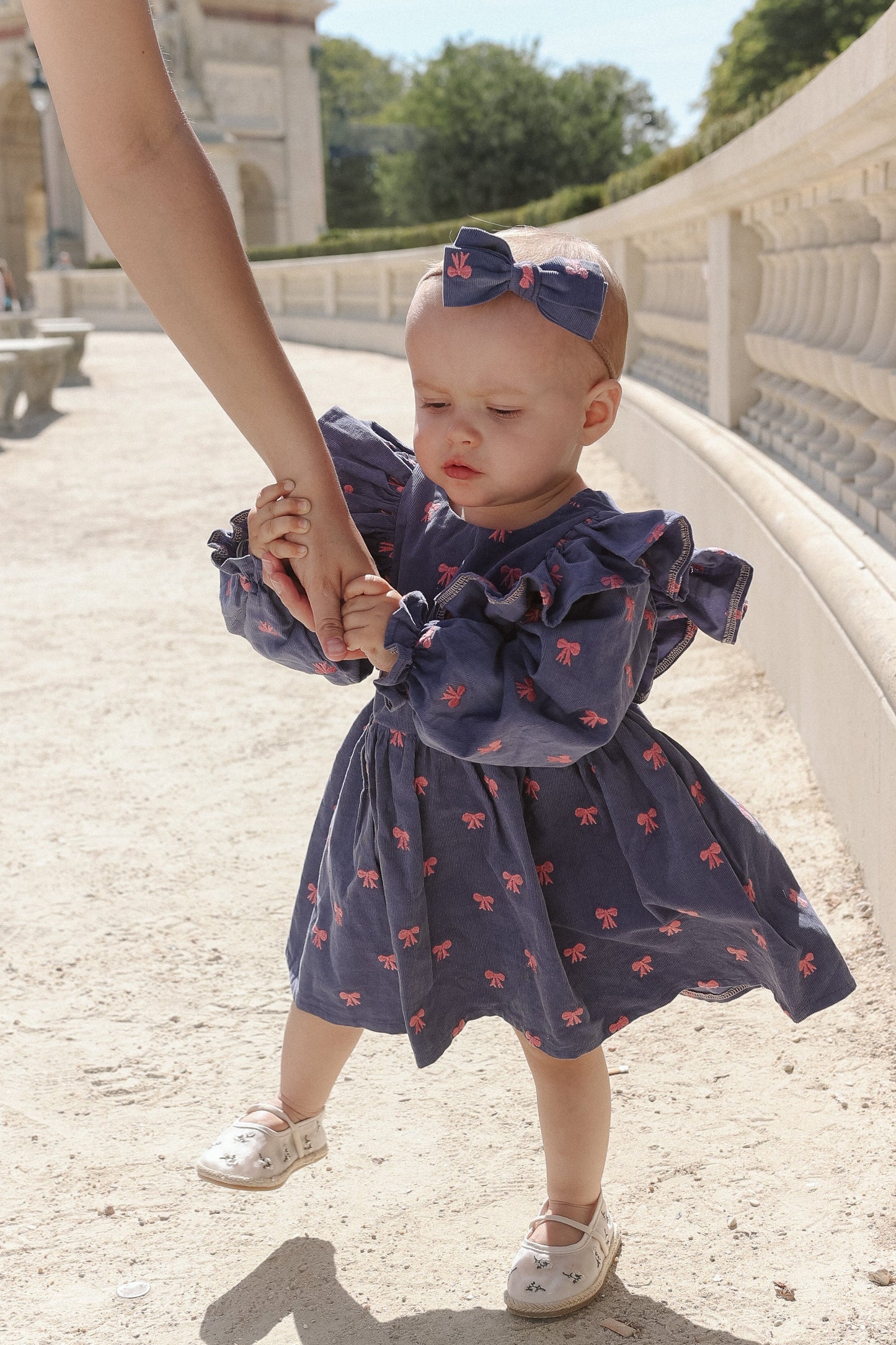 Sukienka w kokardki - niebieska