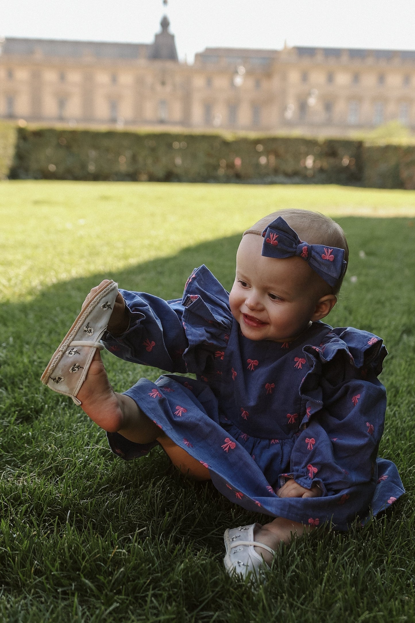 Sukienka w kokardki - niebieska